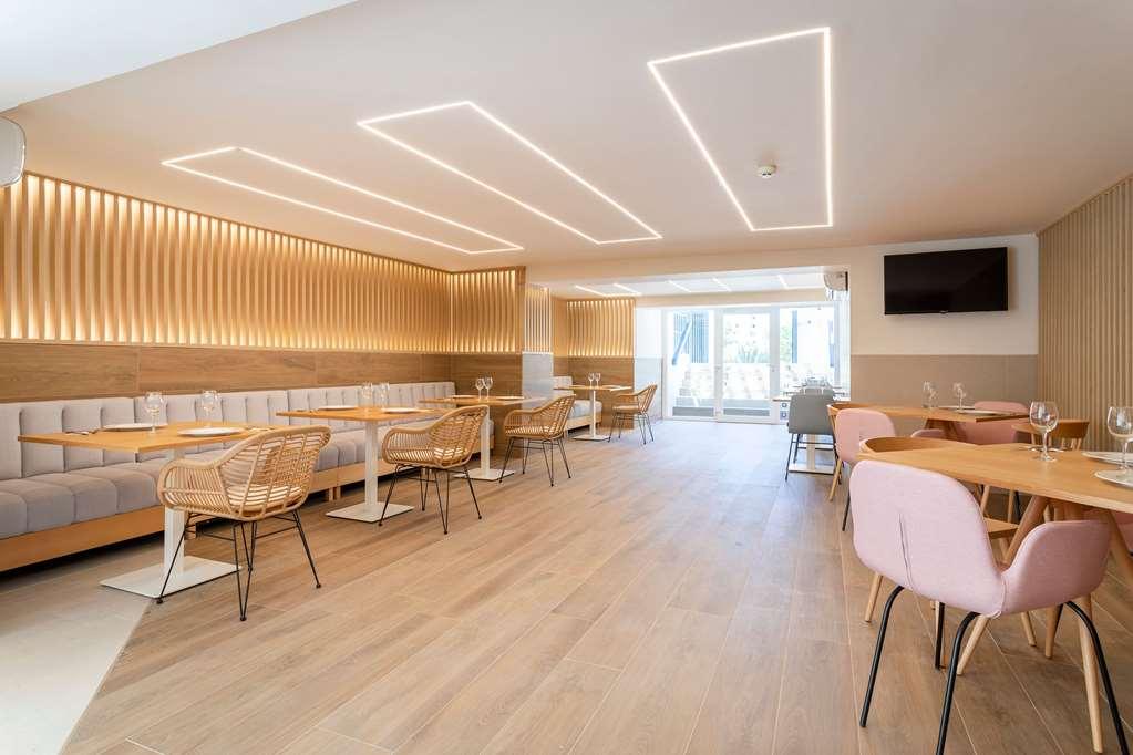 Halley Hotel & Apartments Affiliated By Melia بينايدورم المطعم الصورة